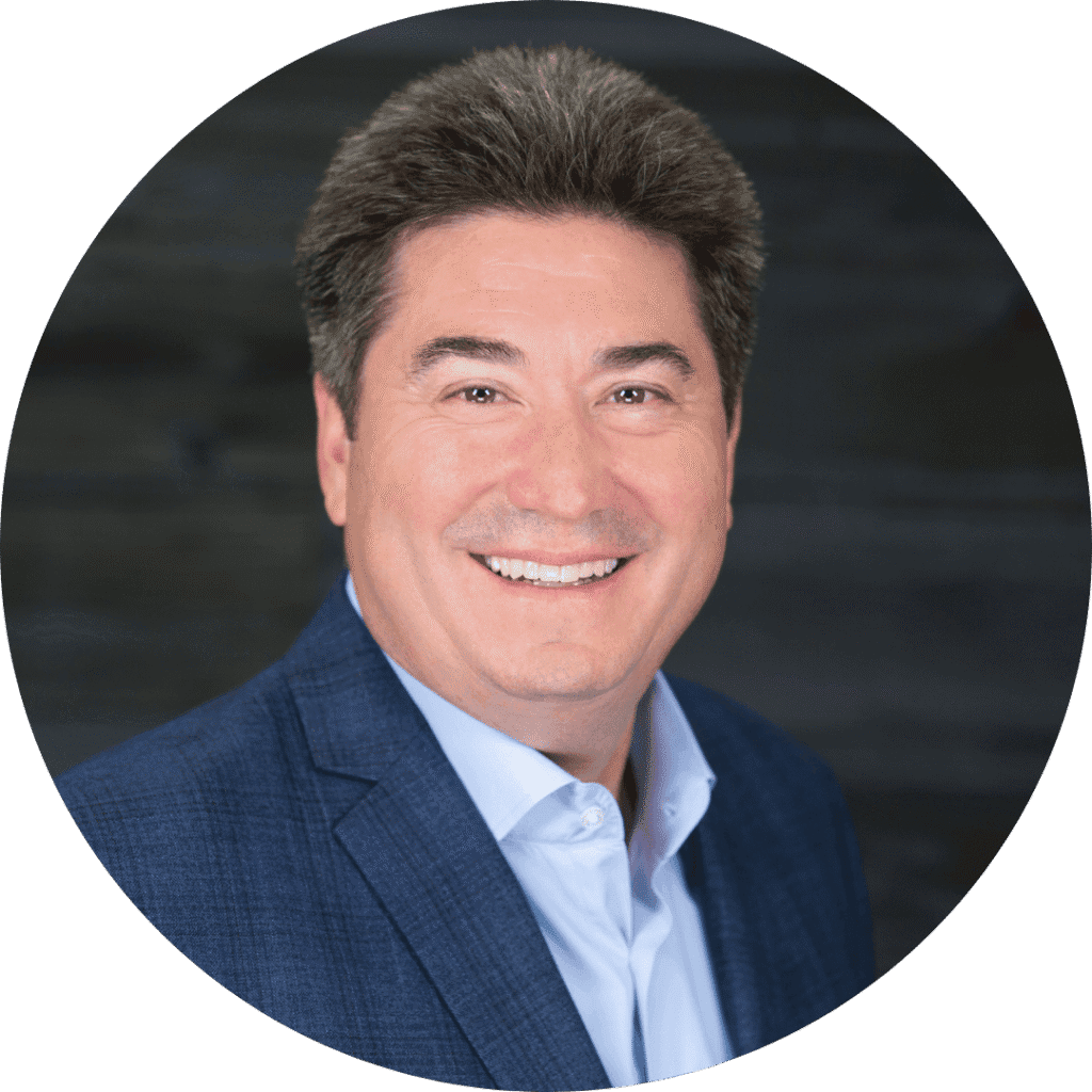 Tom Schurer, Principal of Real Valuation services in a suit jacket portrait