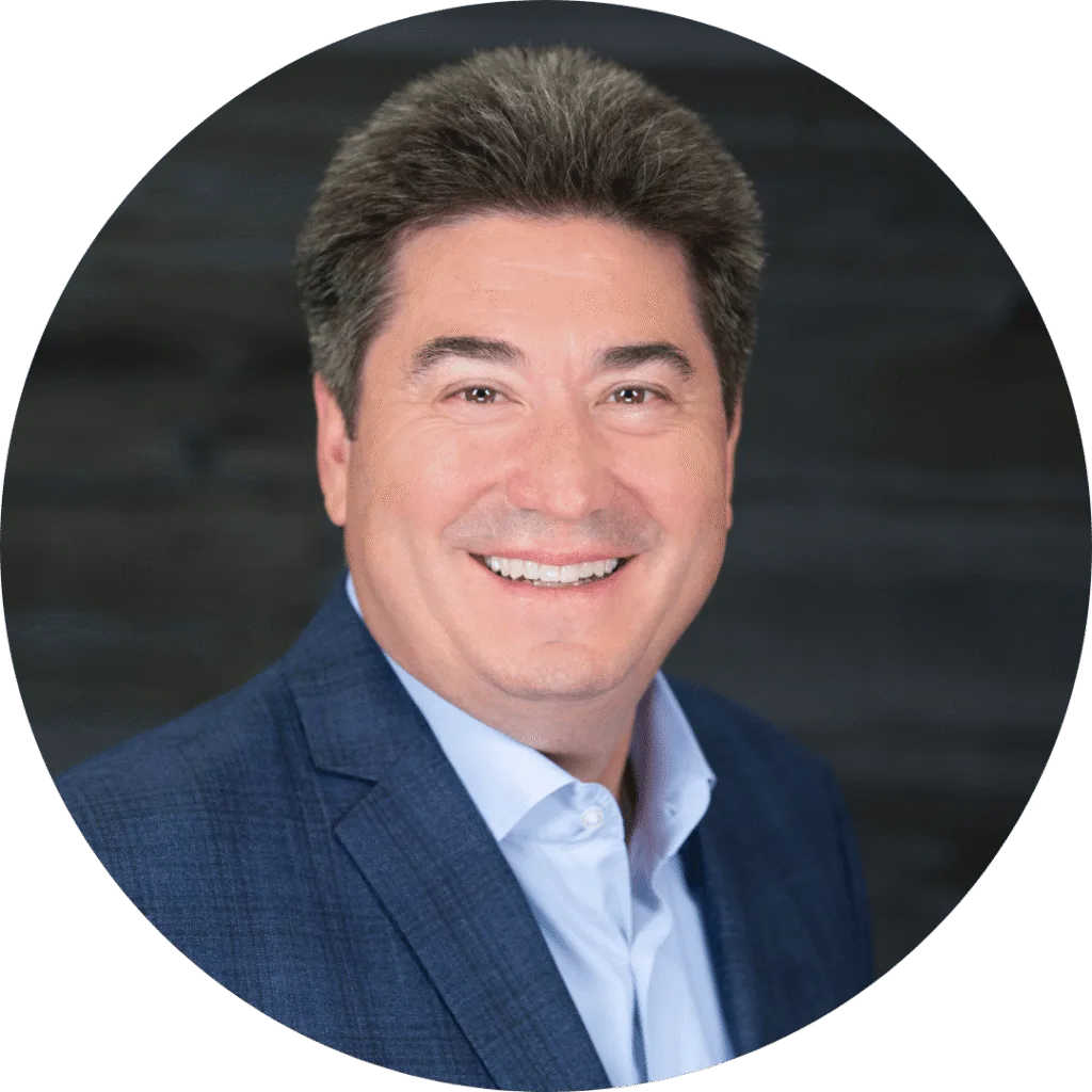 Tom Schurer, Principal of Real Valuation services in a suit jacket portrait